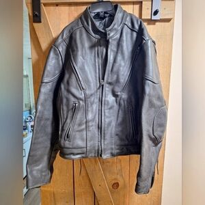 A US Made Co. Black leather jacket in a size 44. Heavyweight Vintage. Pre-loved